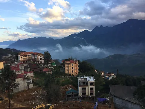 Houses and mountains in the village of Sapa in Northern Vietnam