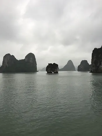 A cloudy day on Halong Bay at the Kissing Rock in Vietnam