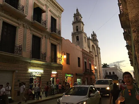 Sunset in Merida, Mexico with busy streets