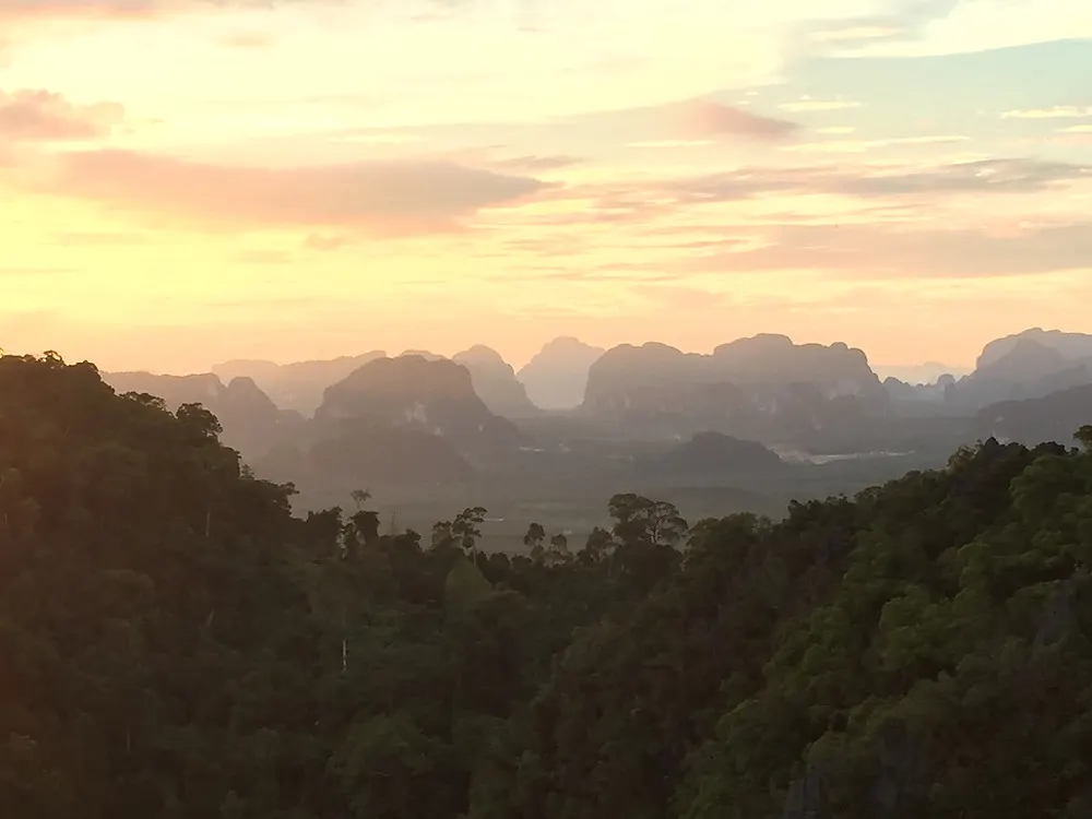 the beautiful sunset view from the top of the Tiger Cave Temple in Krabi Thailand
