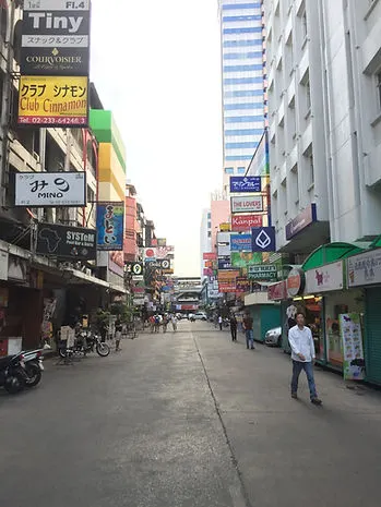 A walking street with shops and restaurants in Bangkok, Thailand