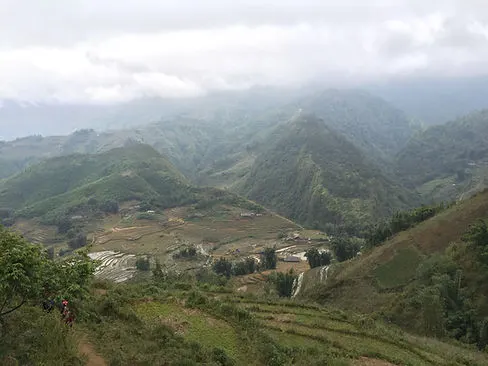 a panoramic view of the rice terraces and mountains of Sapa Vietnam