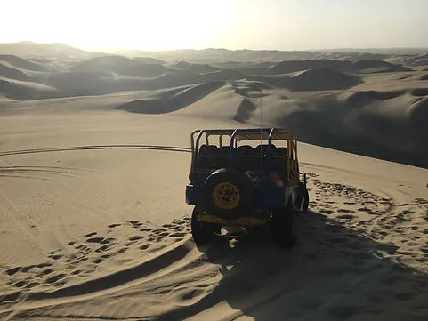 the ATV sandboarding tour through the dunes of the desert in Huacachina and Ica Peru