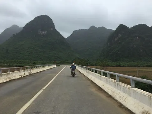 Scootering through Phong Nha National Park on a cloudy day in Vietnam