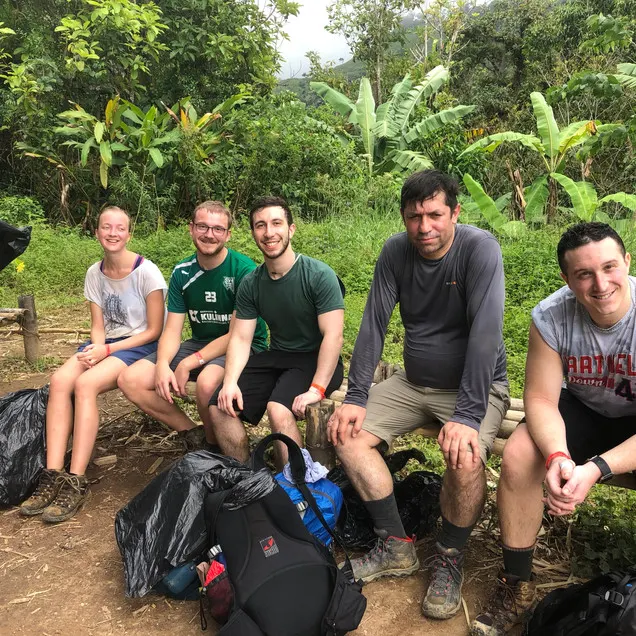 A group of tired hikers on the Lost City Trek in Colombia's Santa Marta Region