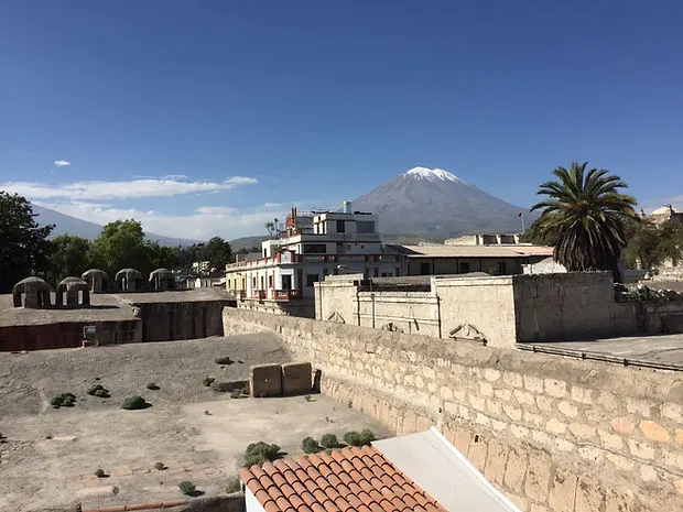 a rooftop view of Arequipa Peru with Volcan Misti in the distance
