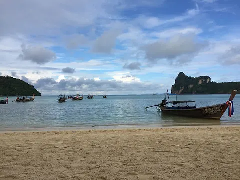 Railay Beach in Krabi, Ao Nang, Thailand with traditional Thai boats
